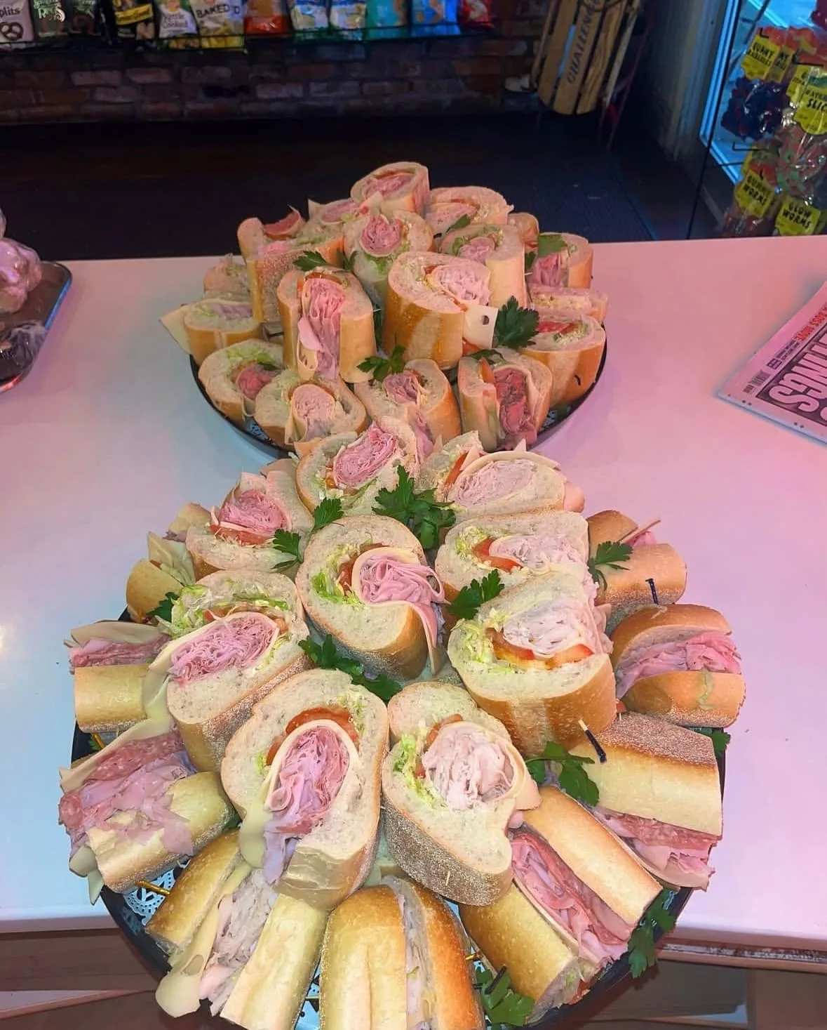 A platter of cocktail sandwiches