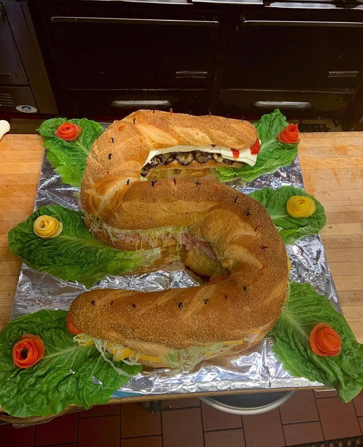A long custom party hero garnished for an event